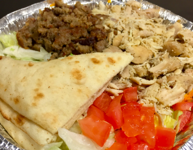 The Halal Guys signature dishes Combo Platter (Chicken and Gyro)
Falafel Sandwich
White Sauce